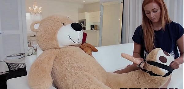  Ginger petite rides strapon teddy bear before riding cock